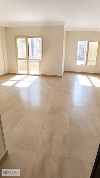 Unfurnished 220 sq m apartment for rent in Al Banafseg Buildings, First Settlement, located directly on North 90th Street.