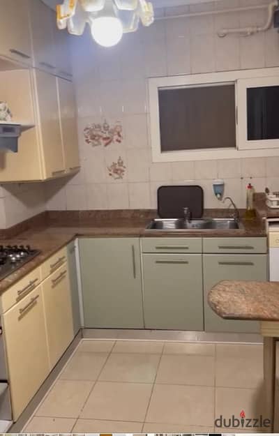 Apartment for sale in the finest location in Dokki on the street, area 180 meters