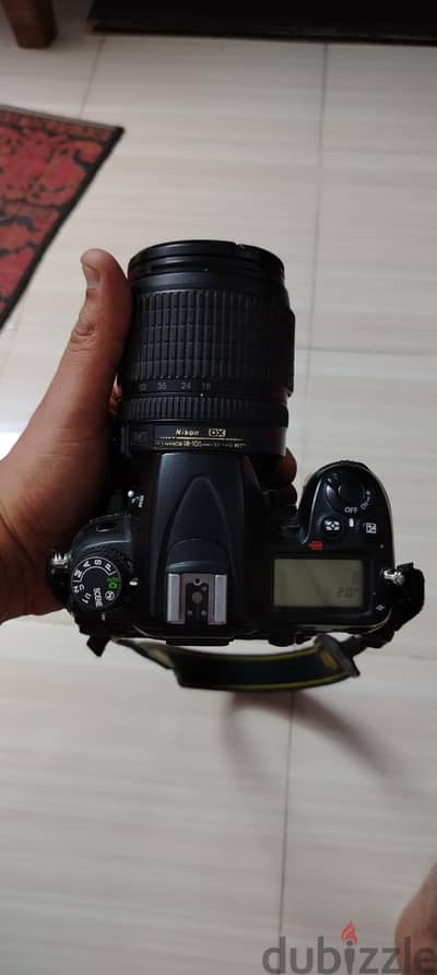 نيكون d7000 بحالة جيدة جدا شتر ٨٦ k معاها لينس ١٨ ١٠٥