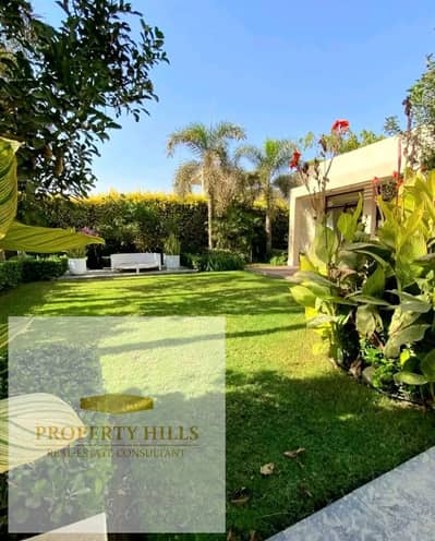 Fully Finished 620 sqm Two-Story VIP Standalone Villa, Ready for Immediate Viewing, in a Prime Location with a Landscape View in New Cairo, on American University Street, near Hyde Park, Mountain View, Palm Hills, and 90th Street.