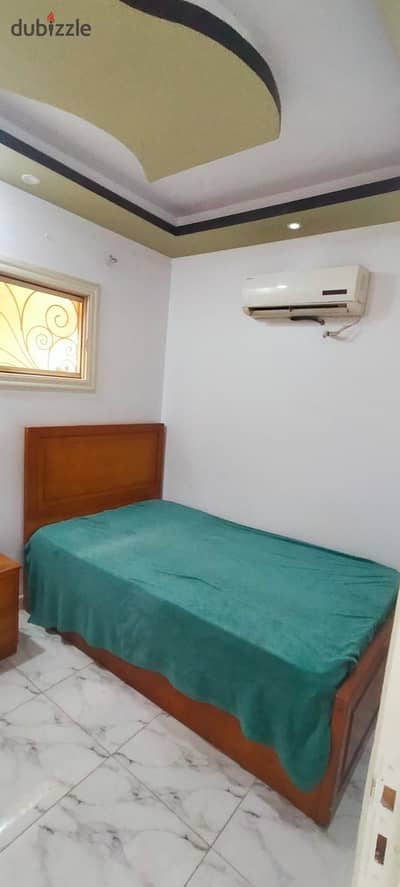 Furnished studio for rent, October, Phase One, including water, steps to the parking lot, Al-Hosari, and the university
