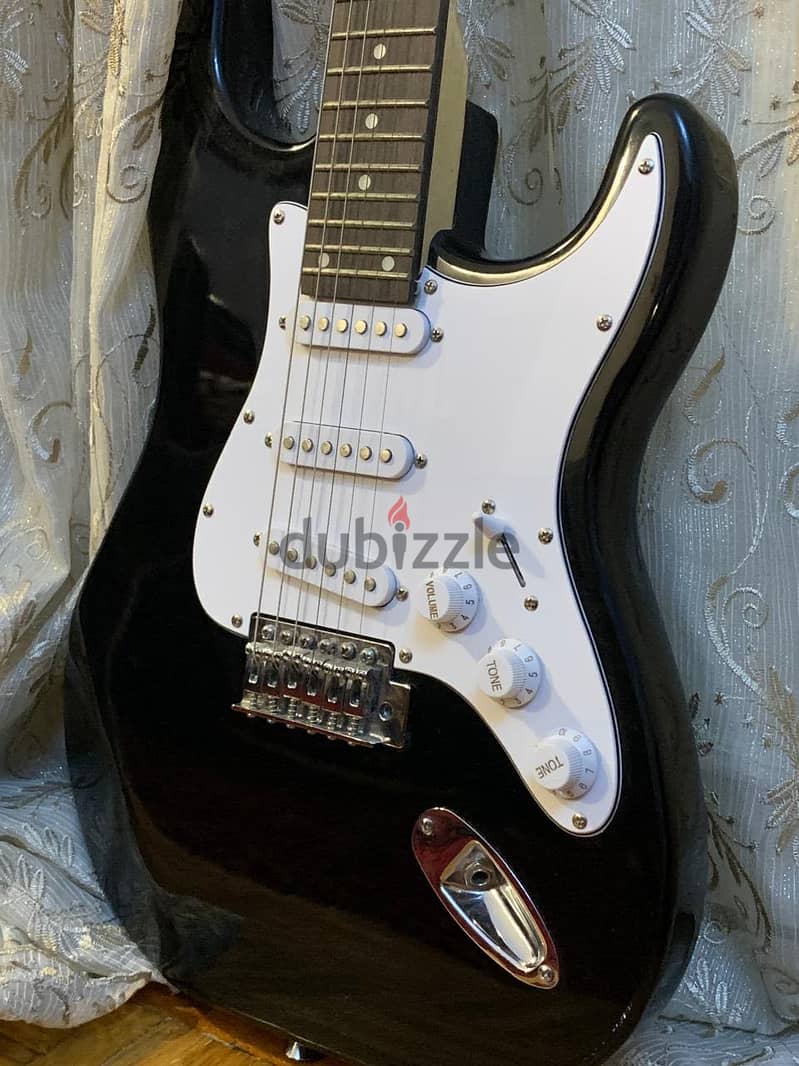 Electric guitar and amplifier 1