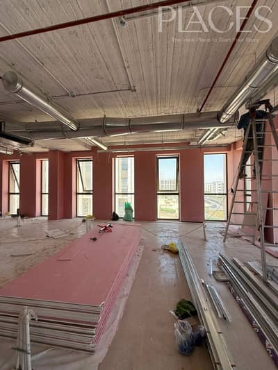 Fully Finished Office Space For Rent In Mivida The Place - New Cairo, with an area of 820 sqm, suitable for large size companies