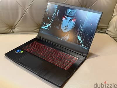 laptop msi rtx 4050 i5-12th gen with mouse and mouse pad