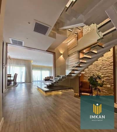 With a huge discount, a fully finished, super-lux townhouse is for sale in Talala Compound, New Heliopolis, with a swimming pool and private garden.
