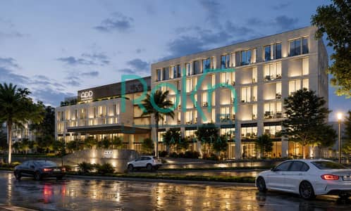 An entire building (​​36,140m) for sale, featuring a prime location and views, situated next to "New Giza" and the "Hyatt Regency" hotel.