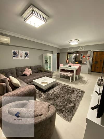 Apartment for sale in the First Settlement, Youth Housing, Northern area, 70 square meters net, two rooms, second floor, Ultra Super Lux finishing, prominent location next to Al-Rehab, Suez Road, and Mirage