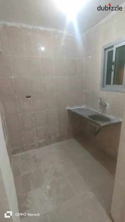 A 65-square-meter, third-floor apartment with high-quality finishing, featuring two bedrooms, a bathroom, a kitchen, and a reception area. It is situa