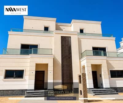 تاون هاوس جاهز للمعاينه مباشرة على الطريق الصحراوى بجوار سوديك دقايق من مطار سفنكس بالقرب من النادى الاهلى