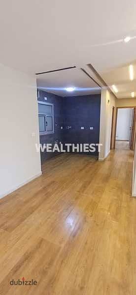 For sale in one of Madinaty's prime locations, B10: an ultra-super-lux hotel-finished apartment with a landscaped garden. Madinaty B10