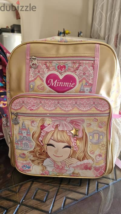 شنطة ظهر Minmie  مدرسية بناتى  بحالة ممتازه