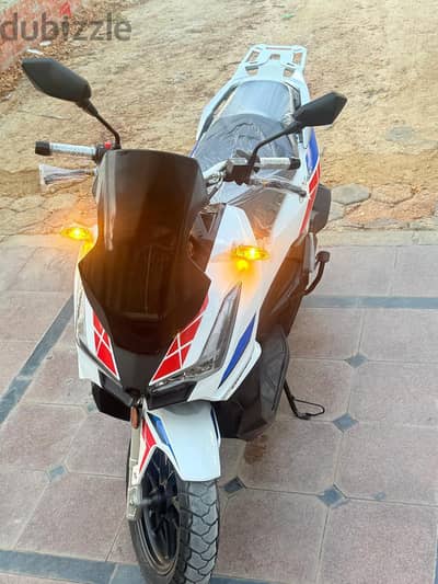 سكوتر هوجين adv 200