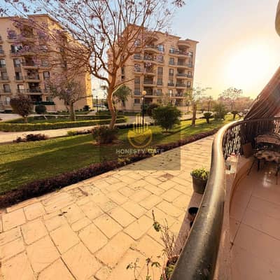For sale: 122 sqm apartment in Al Rehab 2 – Phase 9, near Avenue Mall and Carrefour Market. Elevated ground floor with open garden view, 3 bedrooms