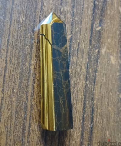 حجر تايجر اي [ tiger eye ]  مسلة لطرد الطاقات السلبية من اي مكان