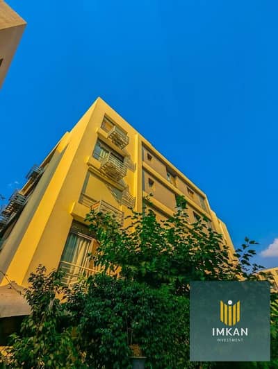 Apartment for sale with a 12-year installment plan and a 50% discount for cash payment, located in the Taj City compound in the First Settlement/New C