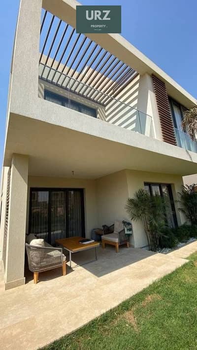 For sale at half price a 4-bedroom villa with a private pool in the best location in New Cairo on the Suez Road next to Madinaty and near Sodic Mivida