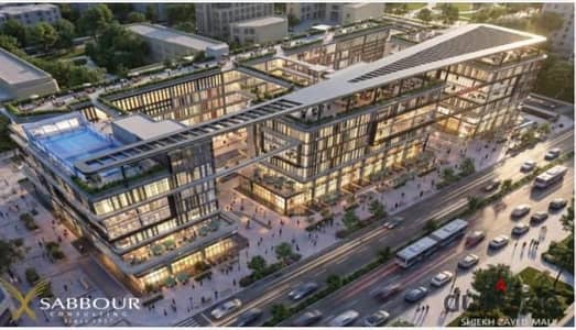 Commercial store for sale in Sheikh Zayed - with flexible payment systems and an investment opportunity that can be operated or rented in the future.