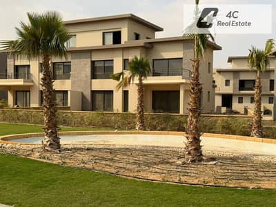 Twin house resale at a negotiable price - in Swan Lake Residence, New Cairo, with the best layout and view in the compound, ready for viewing