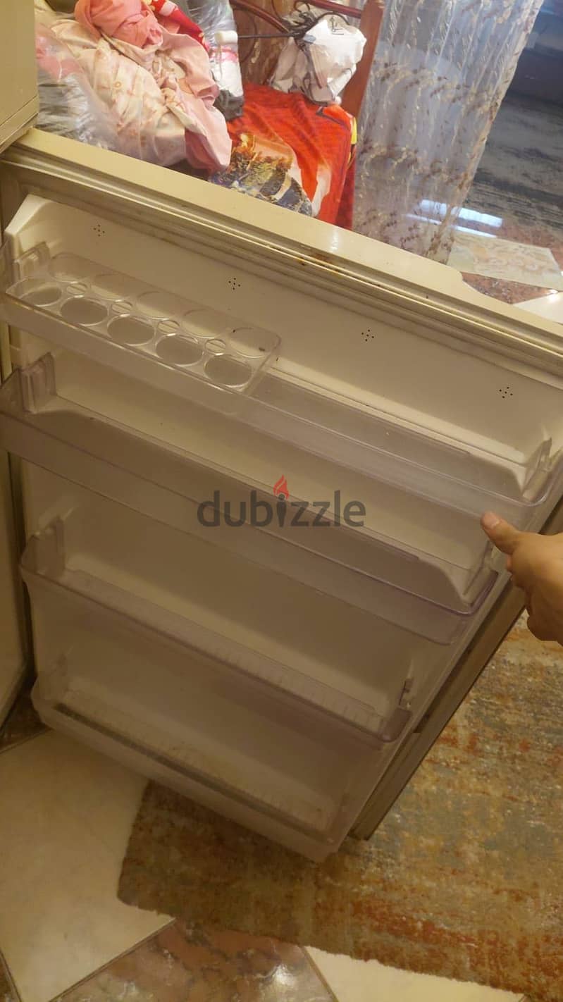 تلاجه 1