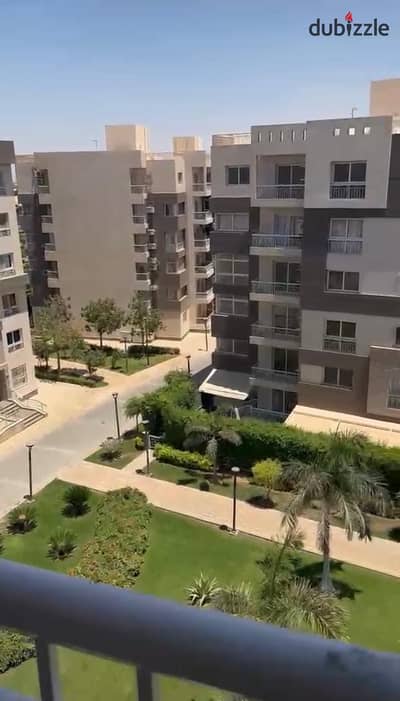 For sale in Madinaty: A 116m² apartment in the Rawasi (Talaat Moustafa) district. It features a garden view, a direct north-facing orientation, and or
