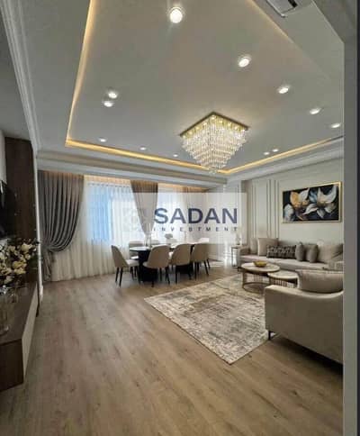 Apartment for sale with a 50% discount, extension of AlThawra Street, opposite Cairo Airport, in Taj City Compound, on the Suez Road, in origami phase