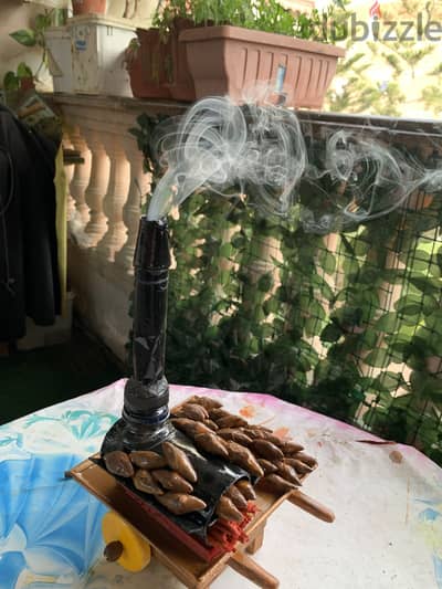 عربة بطاطا ومنها مبخرة