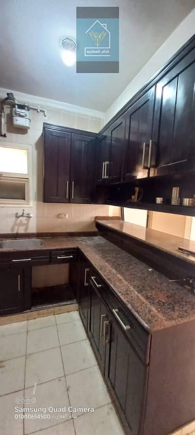 Apartment for rent with kitchen in Sheikh Zayed, Future Buildings, second floor, and it has natural gas