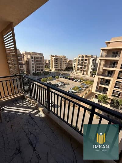 Apartment for sale with a 600,000 EGP down payment and the rest payable over 12 years in a fully serviced and equipped compound, Taj City, in New Cair