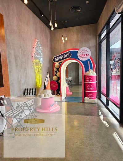 Shop for sale, immediate occupancy, currently rented and operating, generating 300,000 per month, located in the Golden Square area of ​​Fifth Settlement, with the longest payment plan.
