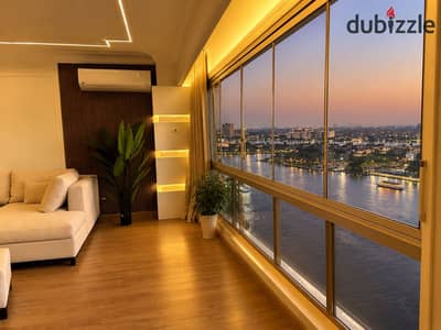 شقة مفروشة فاخرة بإطلالة مباشرة على النيل   بشارع عبدالعزيز آل سعود – المنيل داخل عمارة شيك وراقية، بموقع مميز جدًا، ومجهزة بالكامل هاي سوبر لوكس لتوفير إقامة مريحة وراقية