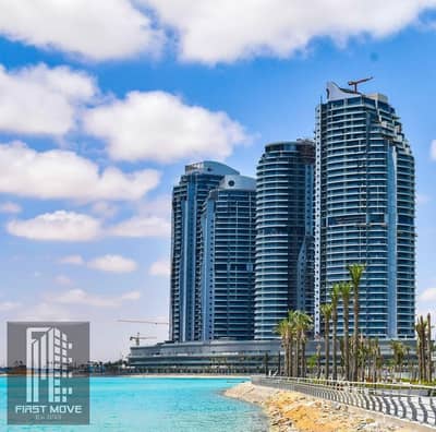 شقة تشطيب فندقي بالتكييفات للبيع بأطلالة دبل فيو مباشرة للبحر واللاجونز بأميز لوكيشن في مدينة العلمين الجديدة بأبراج العلمين Alamien