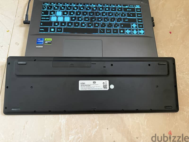 Wireless Bluetooth Keyboard with Phone Holder - (ENG/AR) 2