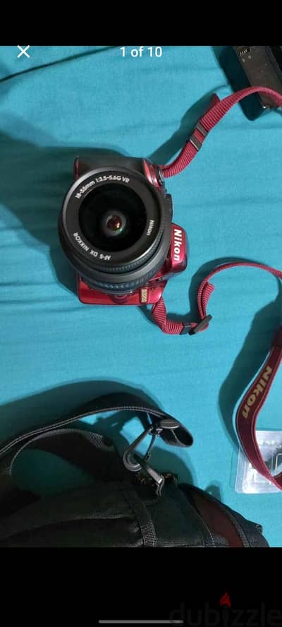 Red Nikon digital camera D3200 set