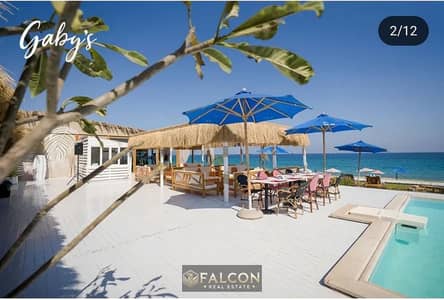 View and receive immediately a 104m² chalet in Ain Sokhna with a breathtaking view at a bargain price from Ro'ya Real Estate, the previous developer o