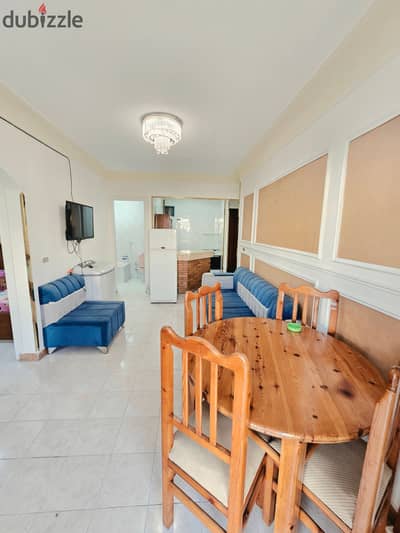 Apartment with furniture and appliances for sale in Al-Ajami, Al-Nukhail Beach, next to the sea, luxurious finishing