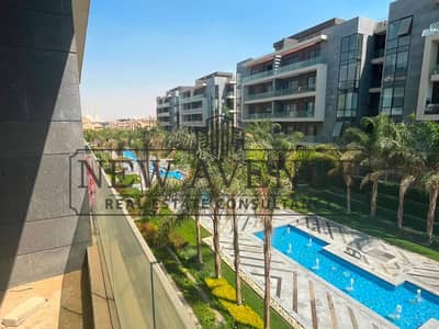 Apartment for sale in Patio Oro compound - New Cairo - Prime location Overlooking greenery and pool - Bahary