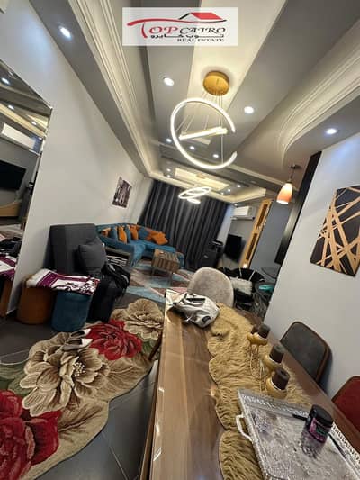 Apartment for sale in Madinaty in B7 finishes of super lux. Sale with furniture and devices in a very distinguished location of services.