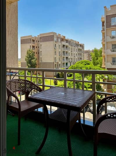 Madinaty B7 2nd floor apt w/ park view. Fully AC, 2BR, modern 2026 tech, free WiFi, 24/7 security near South Park. Families only (marriage ID).