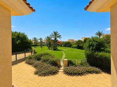 For sale in Madinaty, an independent villa C, land 1132 meters, without finishing, wide garden view