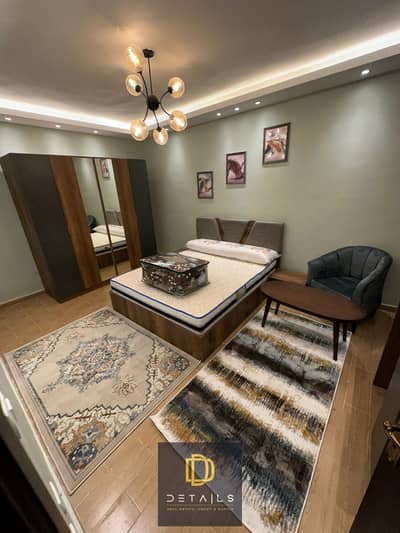 Fully furnished ground-floor apartment with a private garden, featuring modern high-end furniture and finishing, fully air-conditioned, and convenient