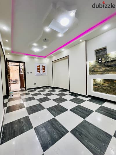 A special entrance apartment on the ground floor in Alexandria, Al-Ajami, Sandy Beach, next to the sea and all services and the commercial market