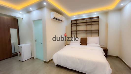 Single Studio for Rent includes electricity and all services in the best location in 6th of October City, Second District, Seventh Neighborhood, in front of MSA University. The studio includes electricity, water, gas, cleaning, a guard, an elevator, and furniture replaced every week, along with weekly cleaning, and the laundry also on the place's account.