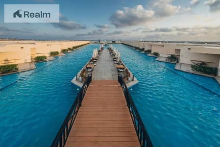DIRECT ON CRYSTAL LAGOON FINISHED TOWNHOUSE WITH ACS | DELIVERY 1Y
