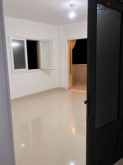 Steps from Al Nozha Street 100m apartment in a prime location near Heliopolis Metro, Heliopolis Hospital, and Al Ghabaa Sports Club