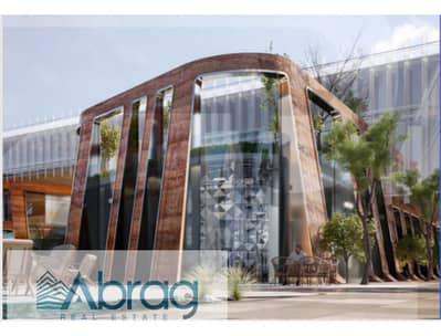 For sale a store with outdoor space with a down payment of 5% and installment up to 8 years in Thero Mall on direct Dahshur Connection Sheikh Zayed