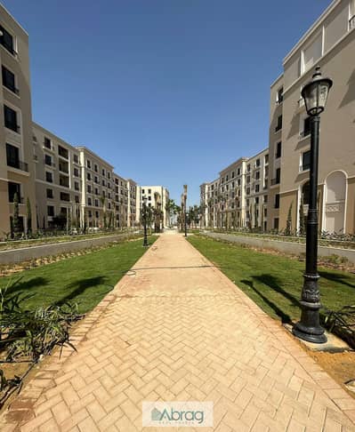 ground floor apartment for sale in village west compound elsheikh zayed fully finished with kitchen and a/cs