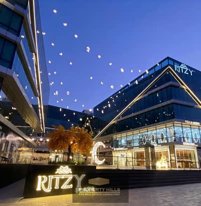 Immediate receipt Fully Finished commercial store 64m in a strategic location in front of Greens in Sheikh Zayed