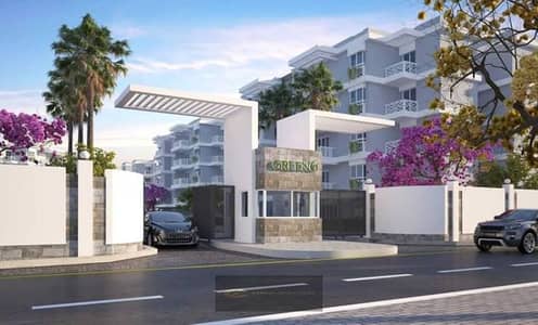 Apartment for sale (174 sqm) with a garden (160 sqm) in 6th of October City, Northern Expansions, behind Arab Mall.
