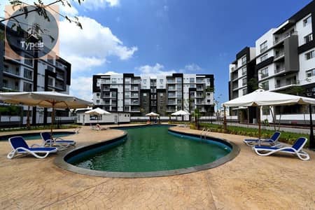 For sale: A distinctive apartment in Jannat October, with a direct view of the entertainment area and landscaped gardens. 130 square meters, 3 bedroom