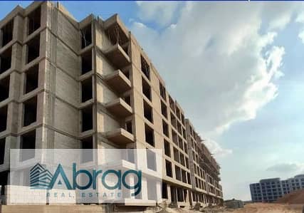 For sale, a 165 ground floor apartment in Garden with installment options and a free membership in the Al-Ahly Club in the Rofan City compound in Sheikh Zayed
